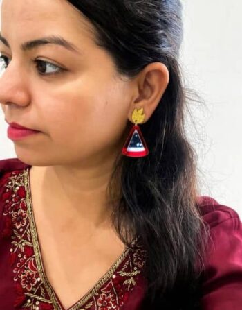 Red triangle Diwali earrings with golden glitter flame-shaped tops